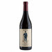 Wine bottle with a label featuring a person in a top hat and coat on a white background