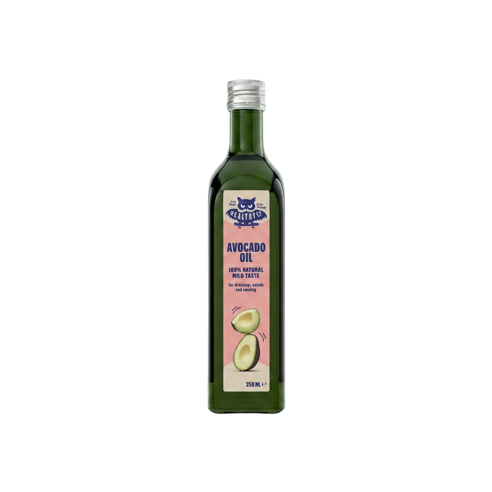 A 250 ml bottle of Meerkats Avocado Oil on a white background. The bottle is dark green glass with a silver metal cap and a pink label featuring a blue Meerkats logo and illustrations of avocados.